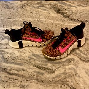 Nike leopard shoes with hot pink logo